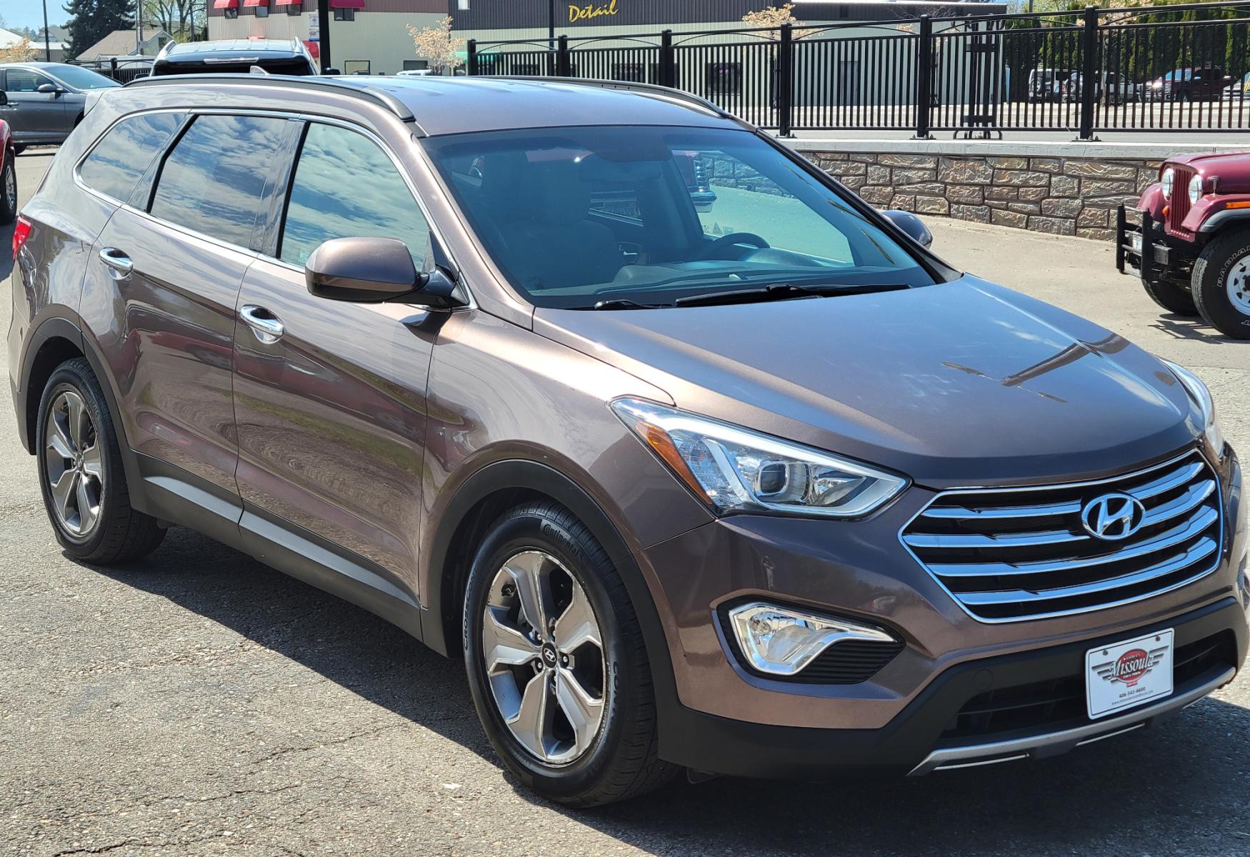 2015 Brown /Tan Hyundai Santa Fe GLS (KM8SMDHF7FU) with an 3.3L V6 engine, 6 Speed Auto transmission, located at 450 N Russell, Missoula, MT, 59801, (406) 543-6600, 46.874496, -114.017433 - Photo #2